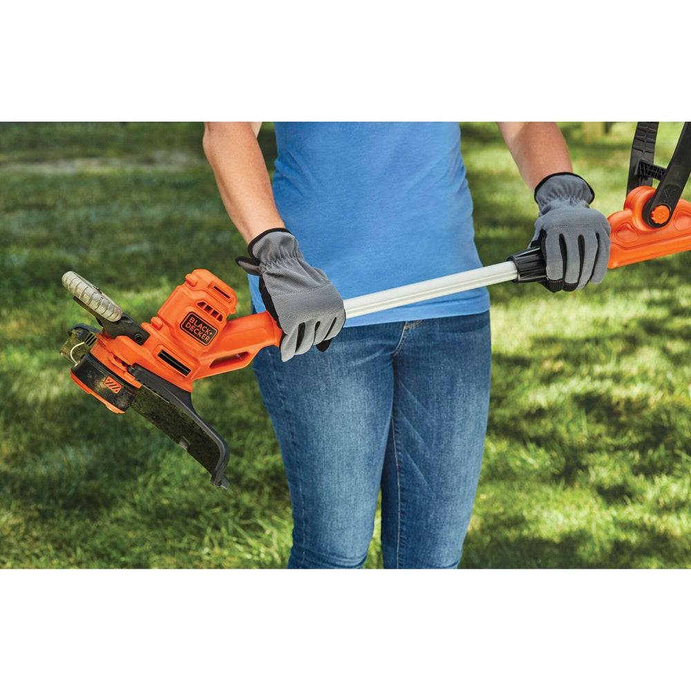 BLACK+DECKER wheeled edger guiding precise lawn borders.