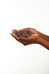 Gummy dispenser shot of Black Girl Vitamins Iron Gummies in a grape flavor.