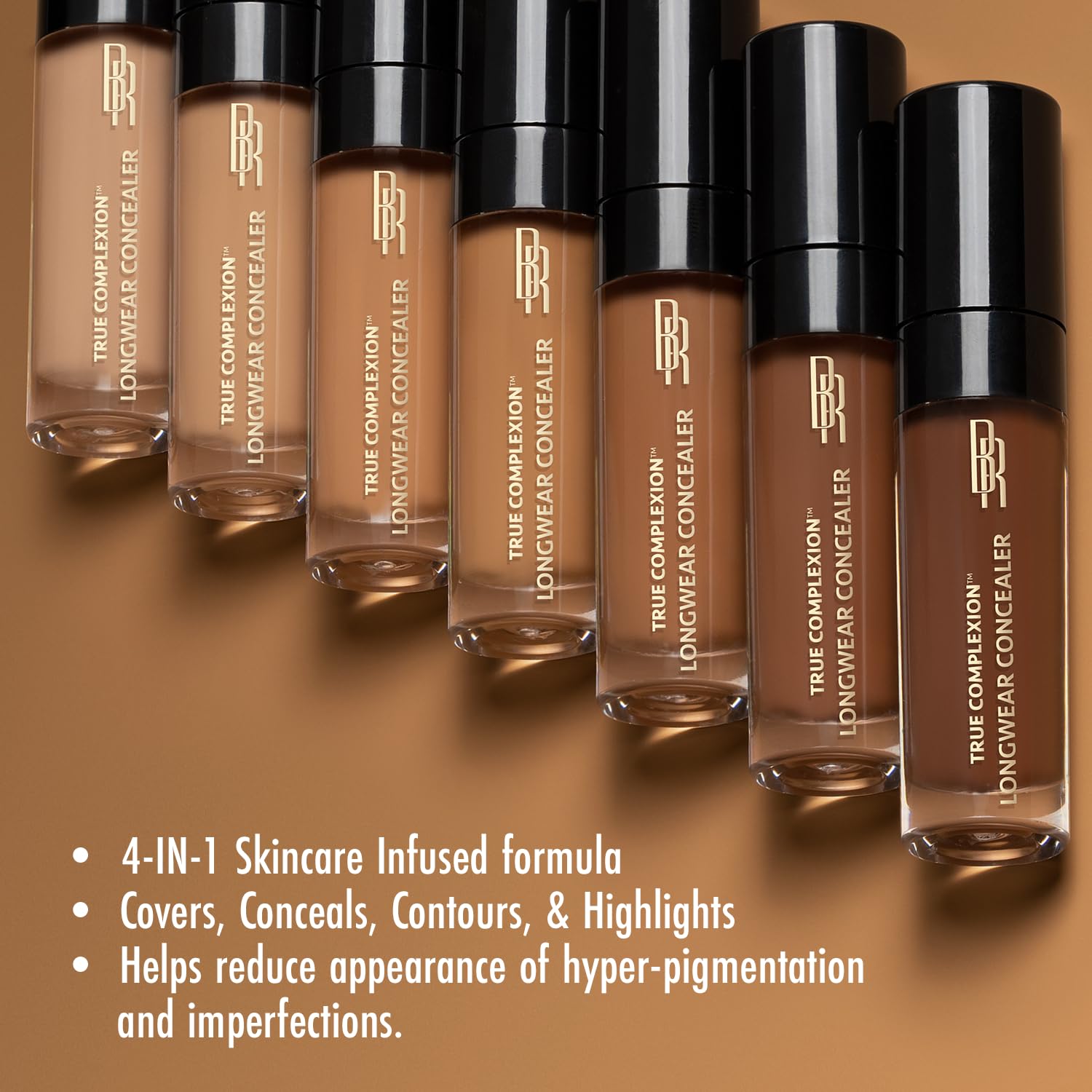 Swatches of Black Radiance True Complexion Longwear Concealer Medium blend seamlessly on medium melanin-rich skin.