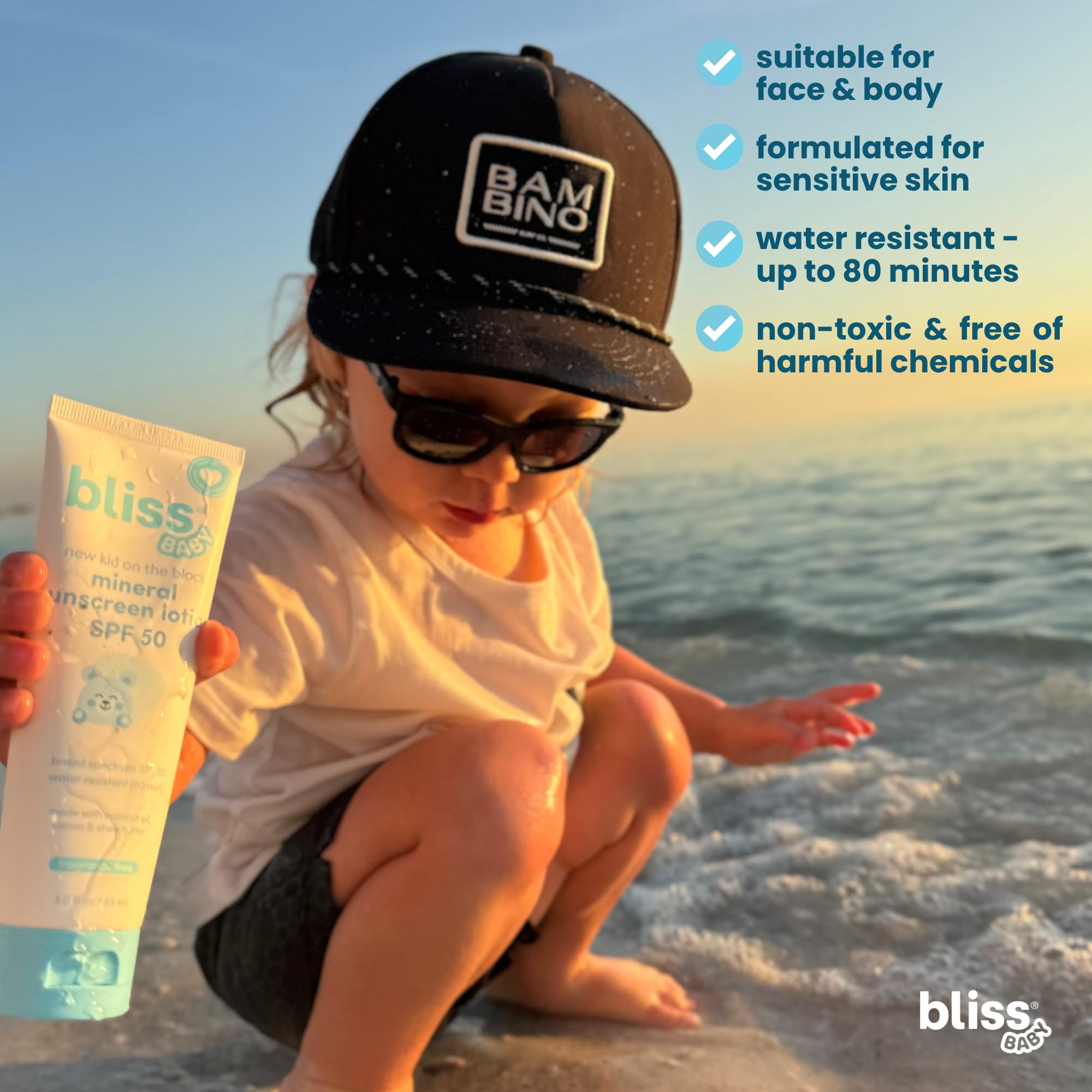 Child playing in water with Bliss sunscreen ready for splash and 80-minute water resistance.