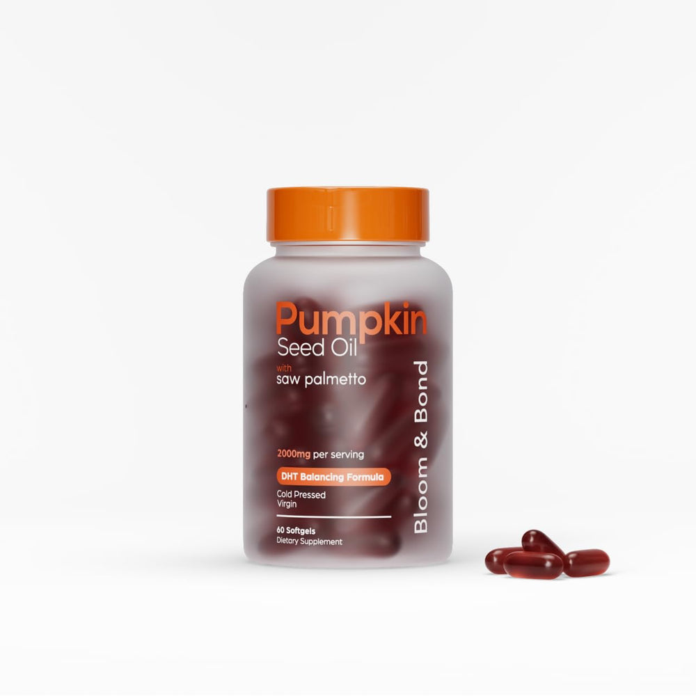 Bloom & Bond pumpkin seed oil softgels bottle showing the product and branding for hair health support