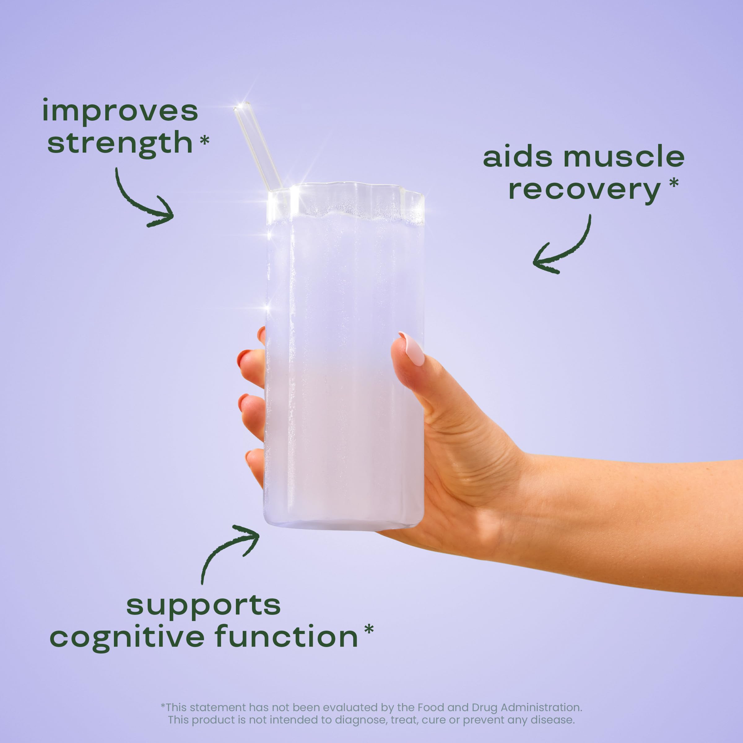 Bloom Nutrition Creatine Monohydrate powder being stirred in a glass for smooth mixability.