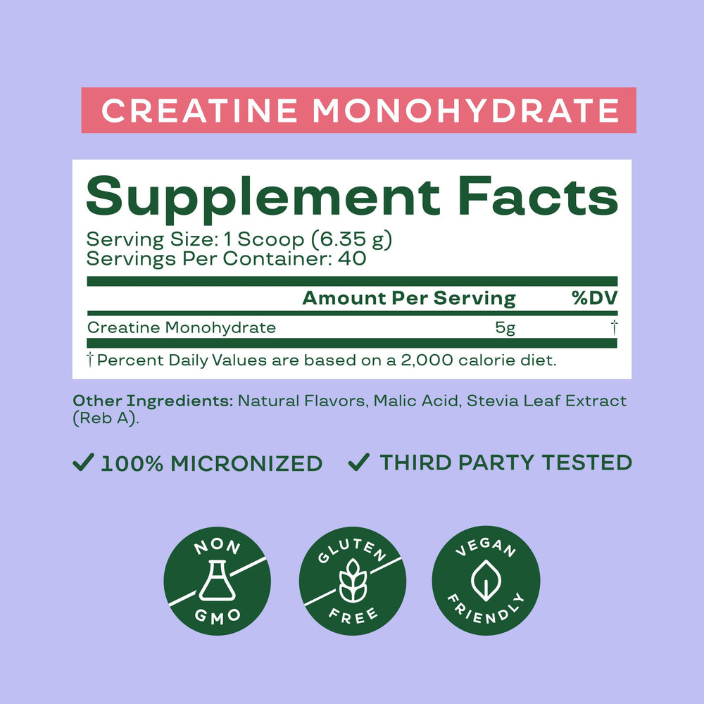 Bloom Nutrition Creatine Monohydrate scoop beside jar enables easy 5 g servings.
