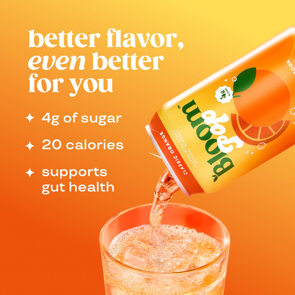 Close-up of Bloom Pop orange bottle label, vibrant flavor cue.