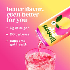 Pouring Bloom Pop Raspberry Lemonade—sparkling moment ready to refresh.