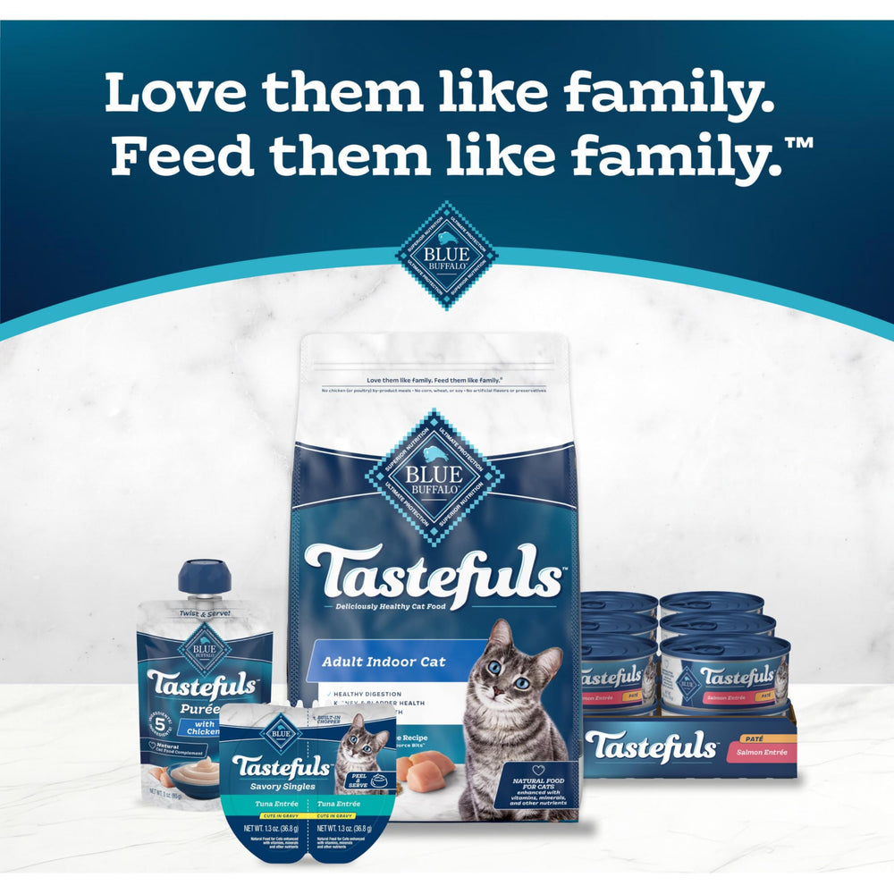 Blue Buffalo Tastefuls Salmon Pate can with a cat enjoying meal.