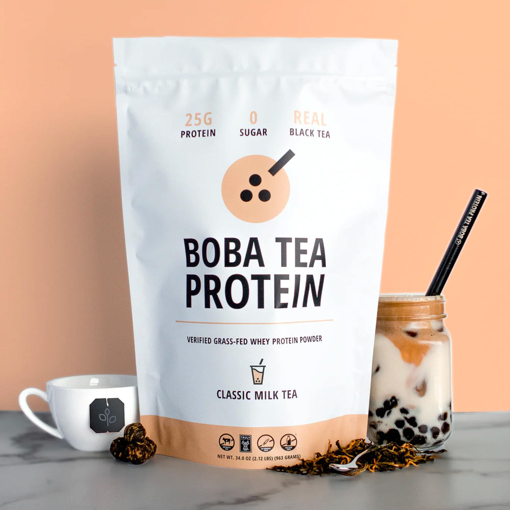 Boba Tea Protein scoop beside powder enables precise serving for balanced nutrition