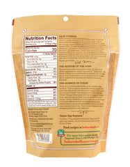 Bob's Red Mill Golden Flaxseed Meal being sprinkled over oats and yogurt