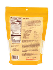 Bob's Red Mill Organic Corn Flour label close-up highlighting organic certification and stone-ground texture.