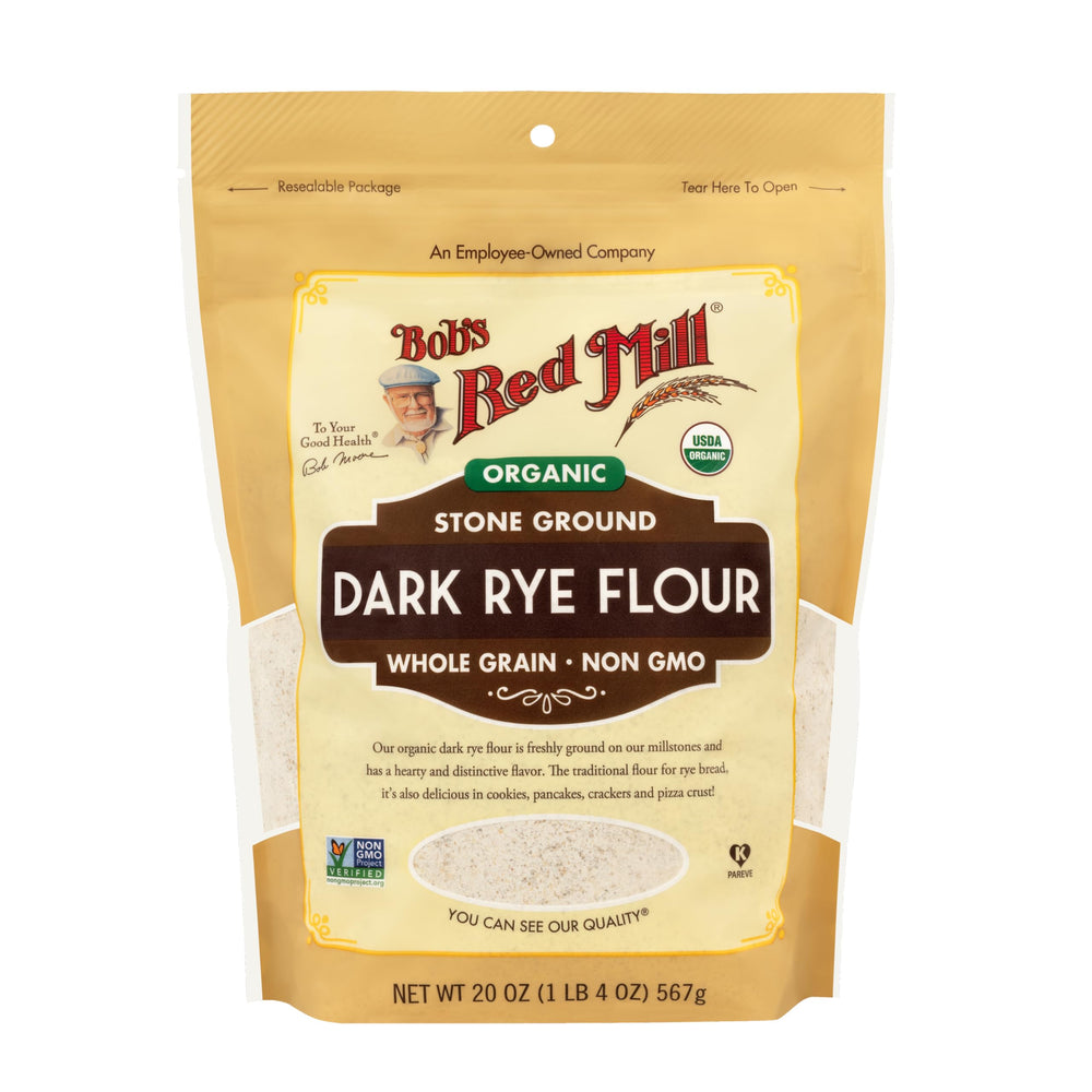 Close-up texture of stone-ground organic dark rye flour