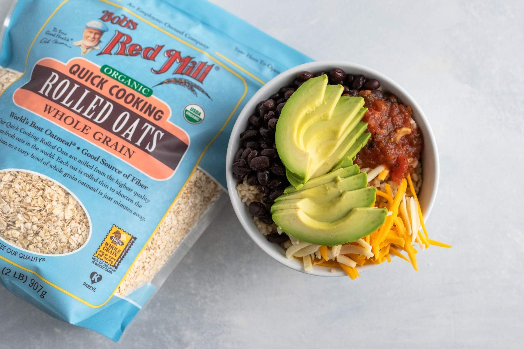 Bob's Red Mill Organic Quick Cooking Rolled Oats granola bowl with clusters.