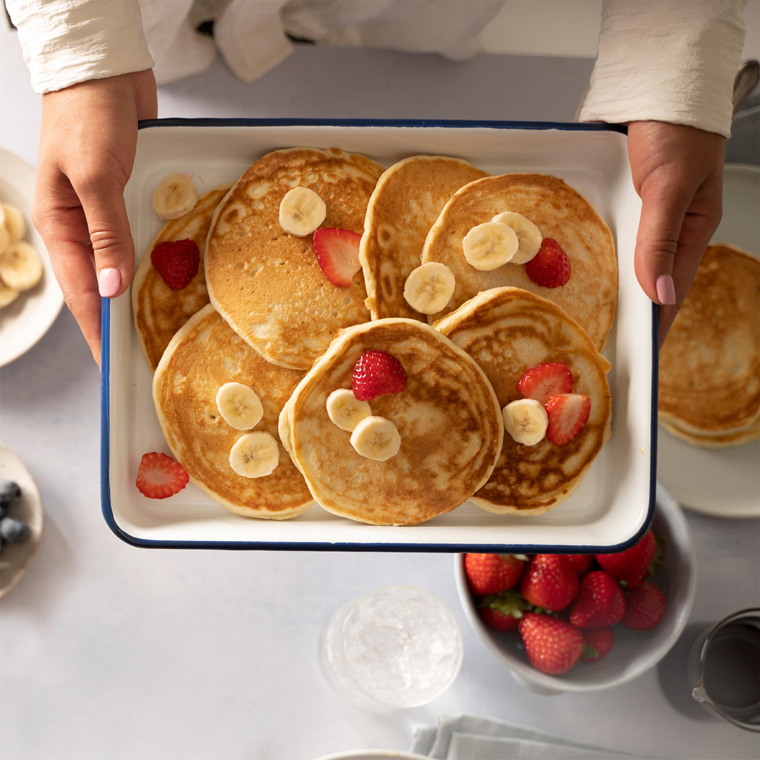 Family breakfast table featuring pancakes made with Bob's Red Mill signature mix.