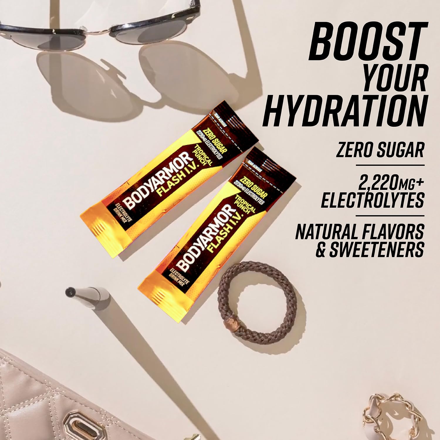 Compact travel kit featuring BODYARMOR Flash I.V. sticks for easy hydration.