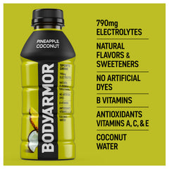 Pineapple Coconut BODYARMOR bottle being poured into a glass