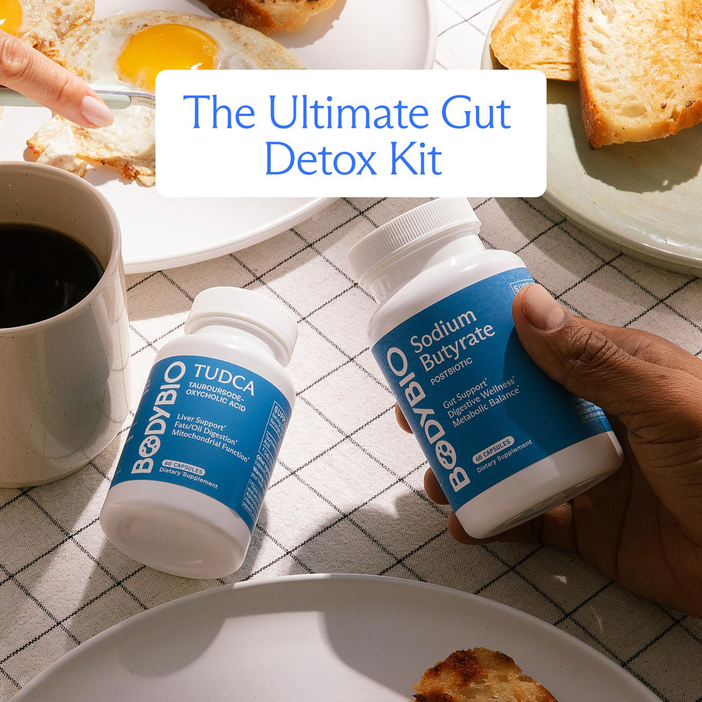 BodyBio TUDCA user taking capsule emphasizes daily supplement routine.