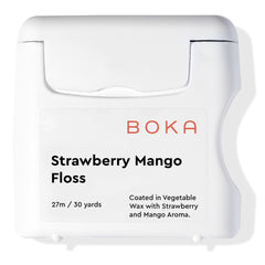 Boka Strawberry Mango floss pack closeup, ready for daily precise cleaning between teeth.