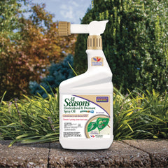 Bonide All Seasons Spray Oil demonstrates spraying action to coat and smother pests.