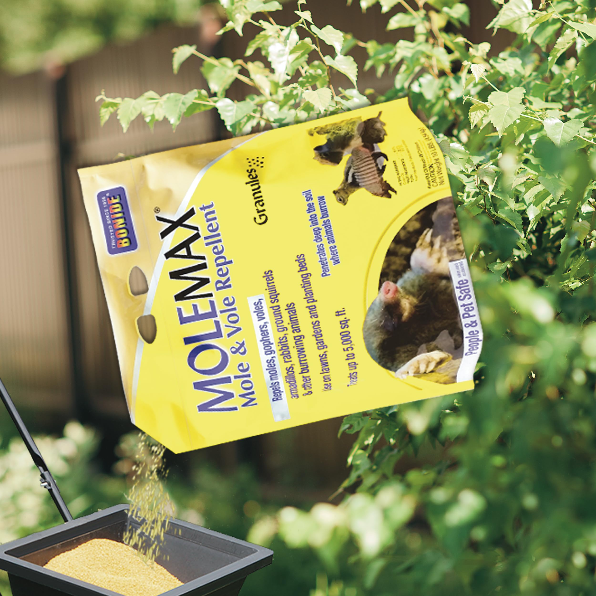 Water lightly after MOLEMAX granules are spread on soil.