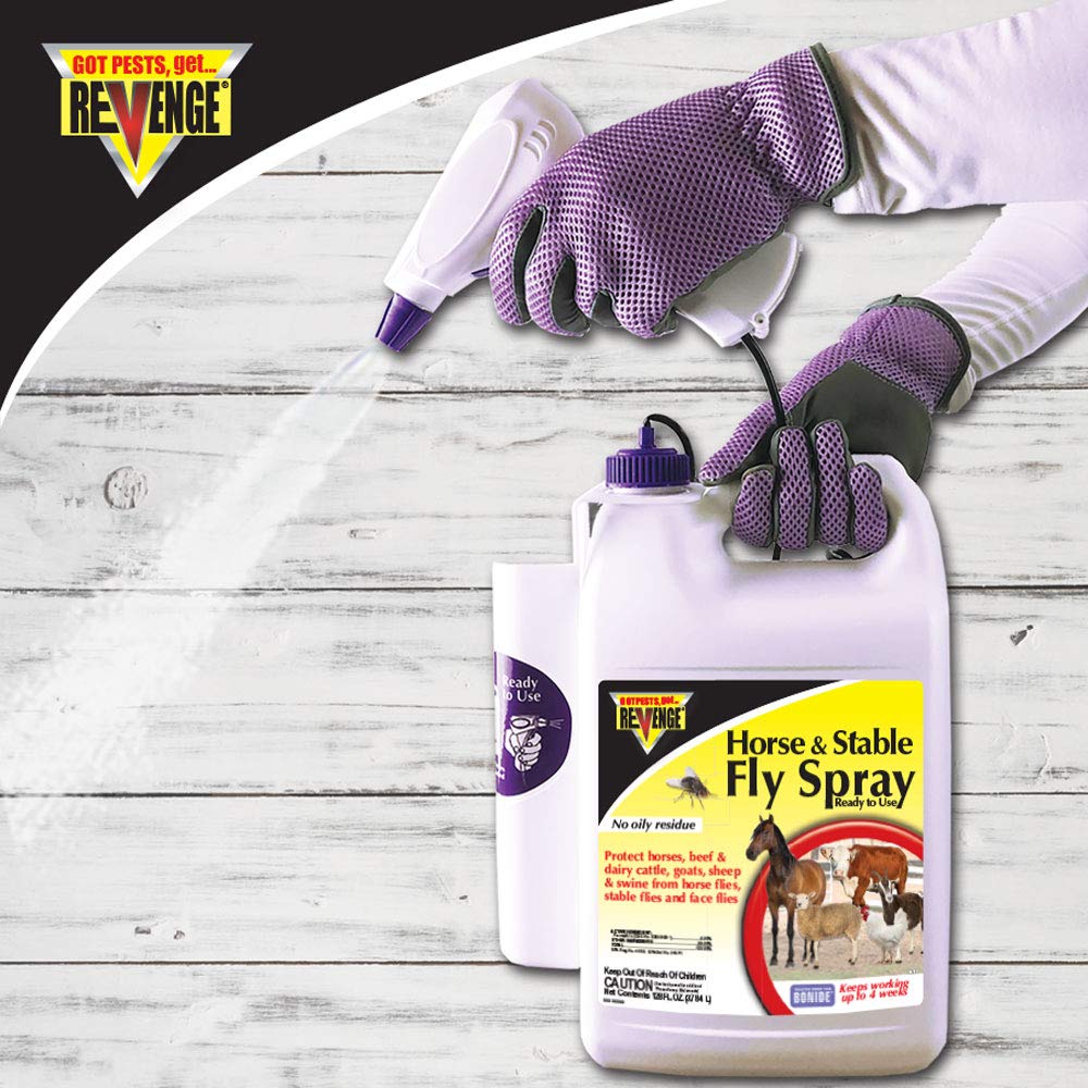 Bonide Revenge spray being applied to a stable area for pest control.