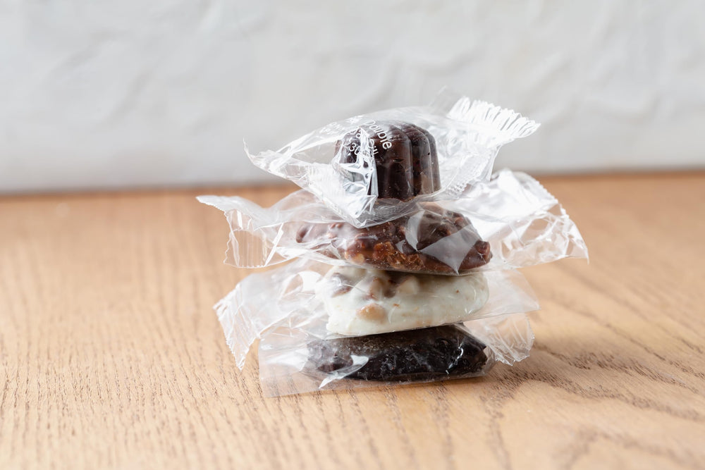 BONNIE AND POP English toffee and chocolate bites in a premium tin.