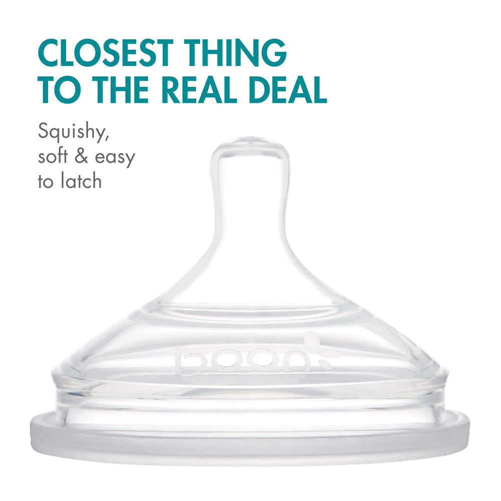 Close-up shows optimal nipple length aiding correct tongue placement.