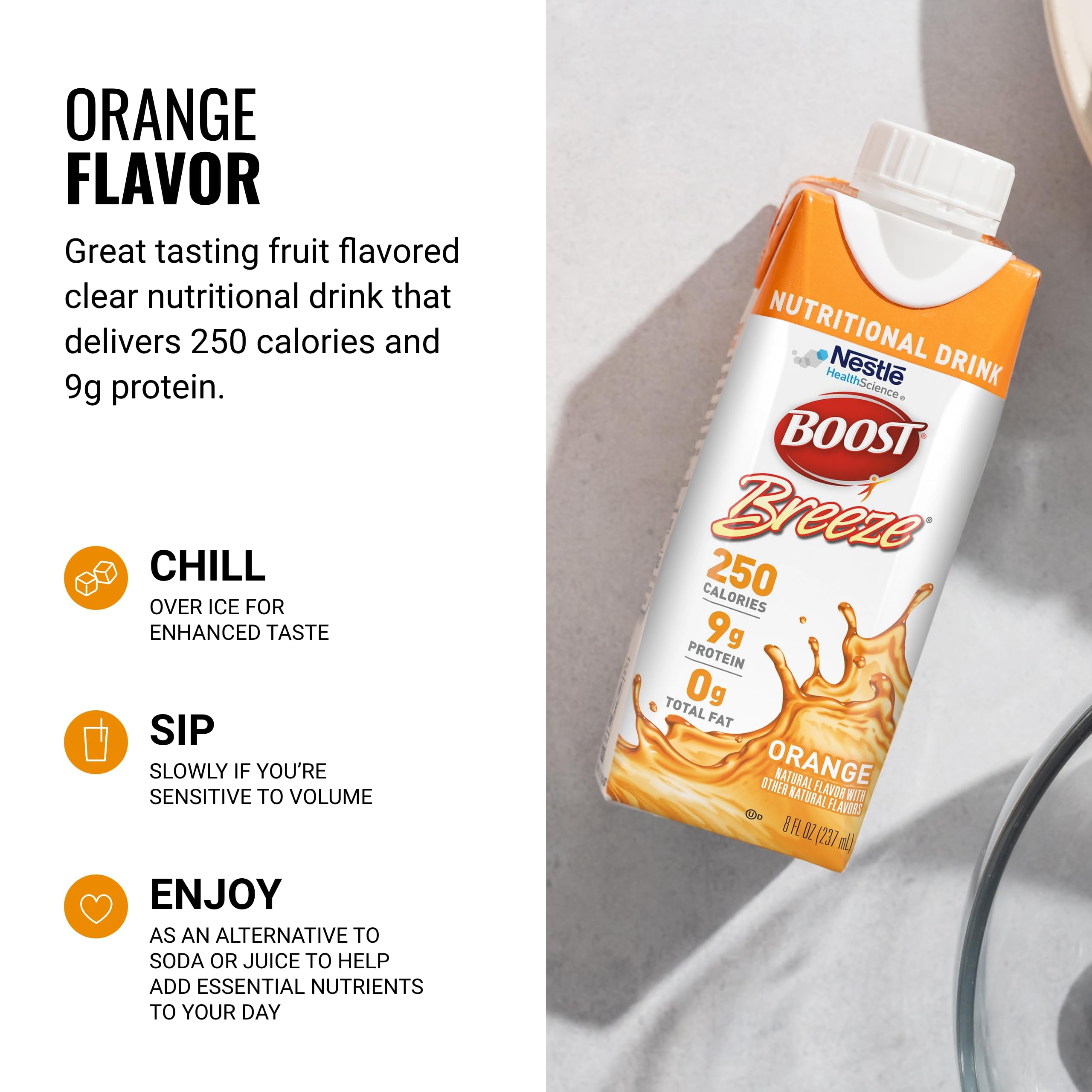 BOOST Breeze refreshing clear liquid in glass with straw for hydrating snack breaks.