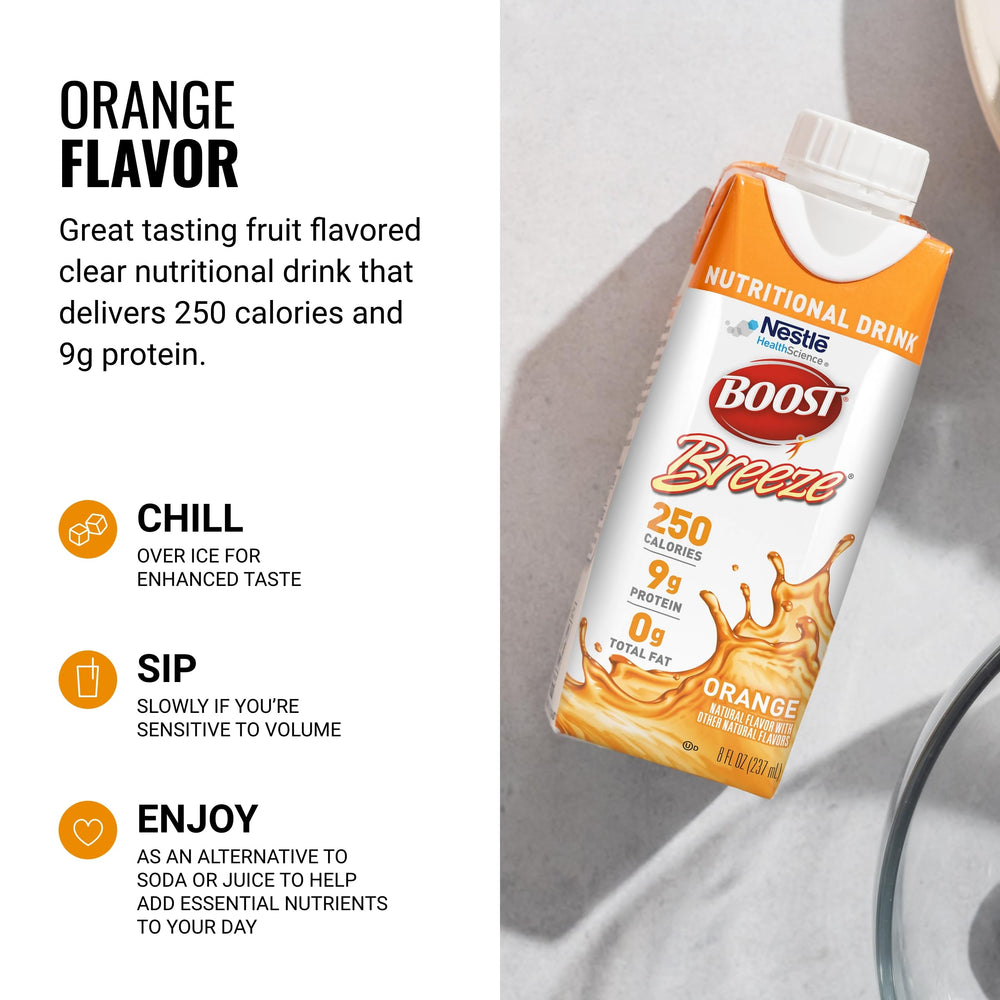BOOST Breeze refreshing clear liquid in glass with straw for hydrating snack breaks.