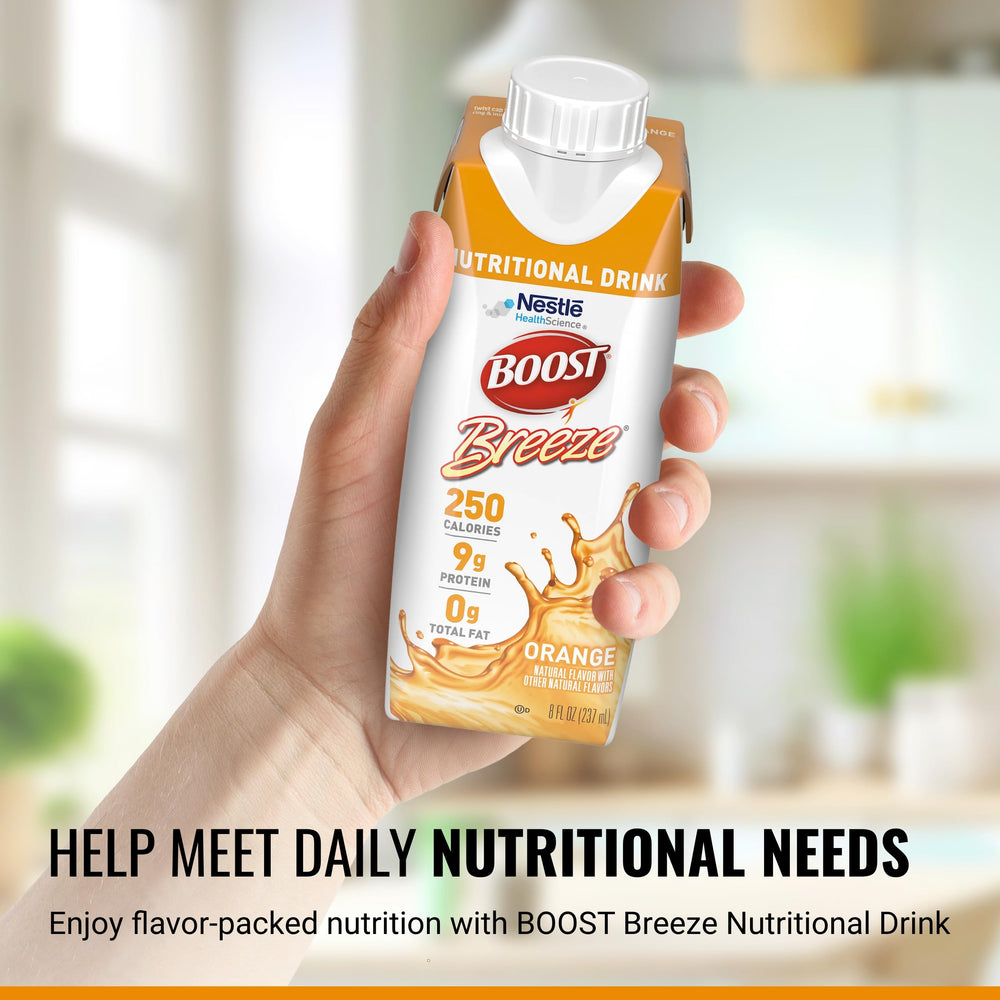 BOOST Breeze wildberry-glass showcases a tasty, vitamin-rich drink for daily balance.