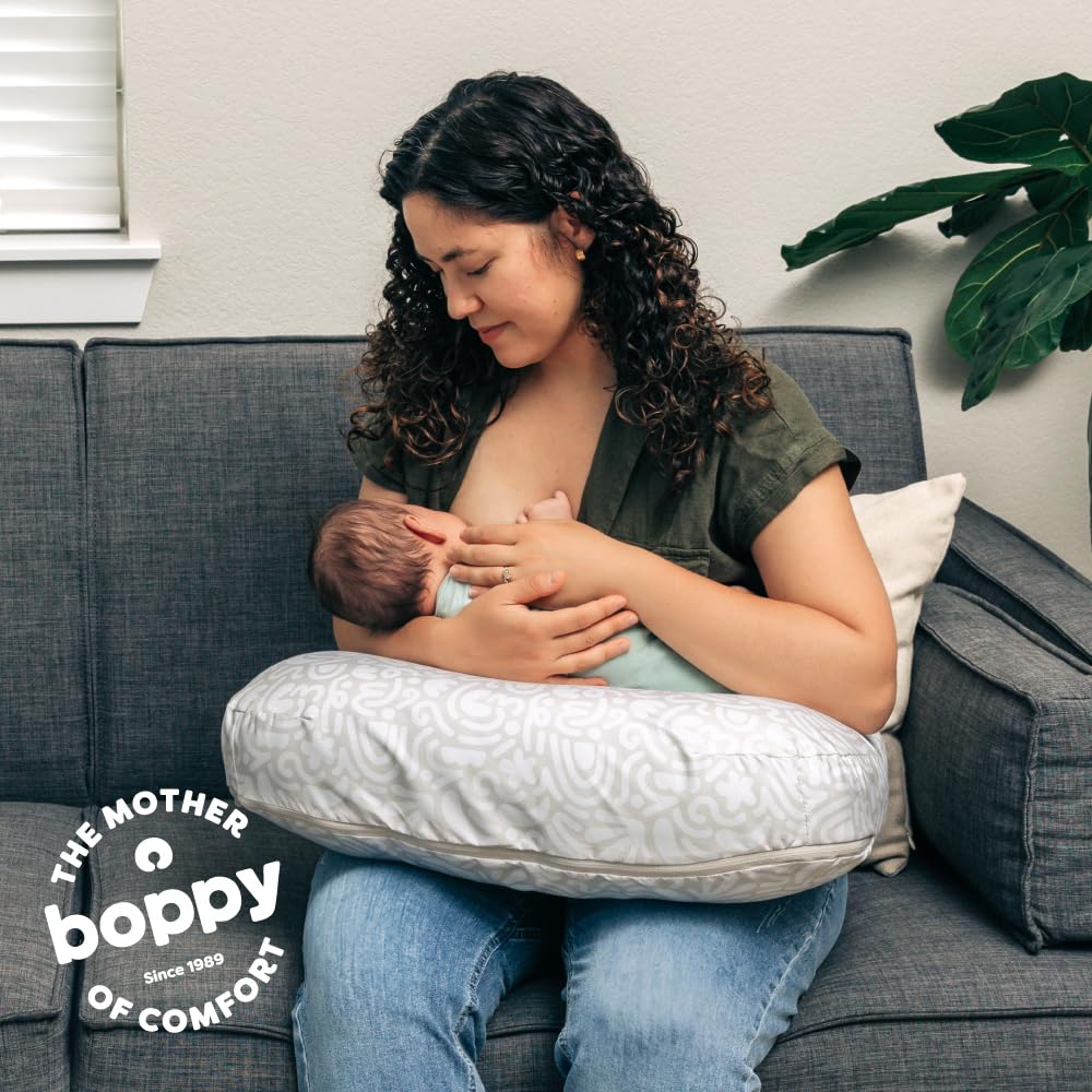Boppy Nursing Pillow ergonomic design adapts easily around you.