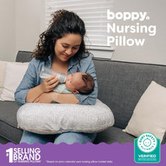 Boppy Nursing Pillow demonstrates higher lift to bring baby closer for easy latch.
