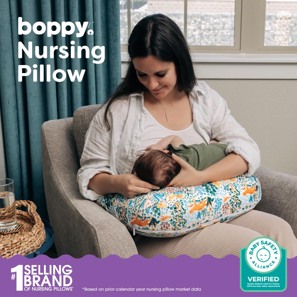 Boppy Nursing Pillow with spacious feeding surface helps proper positioning.