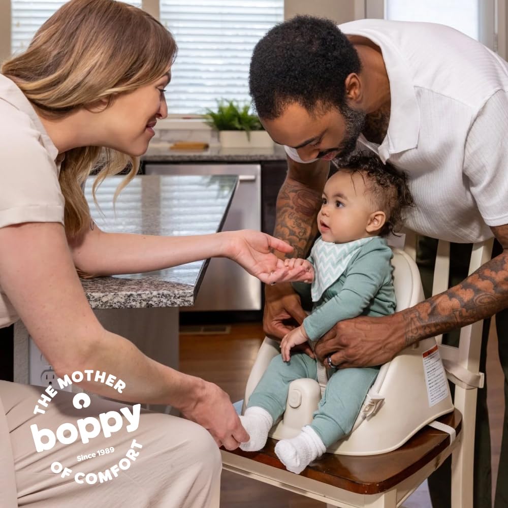 Lightweight Boppy Proper Posture seat with carry handle for easy transport.