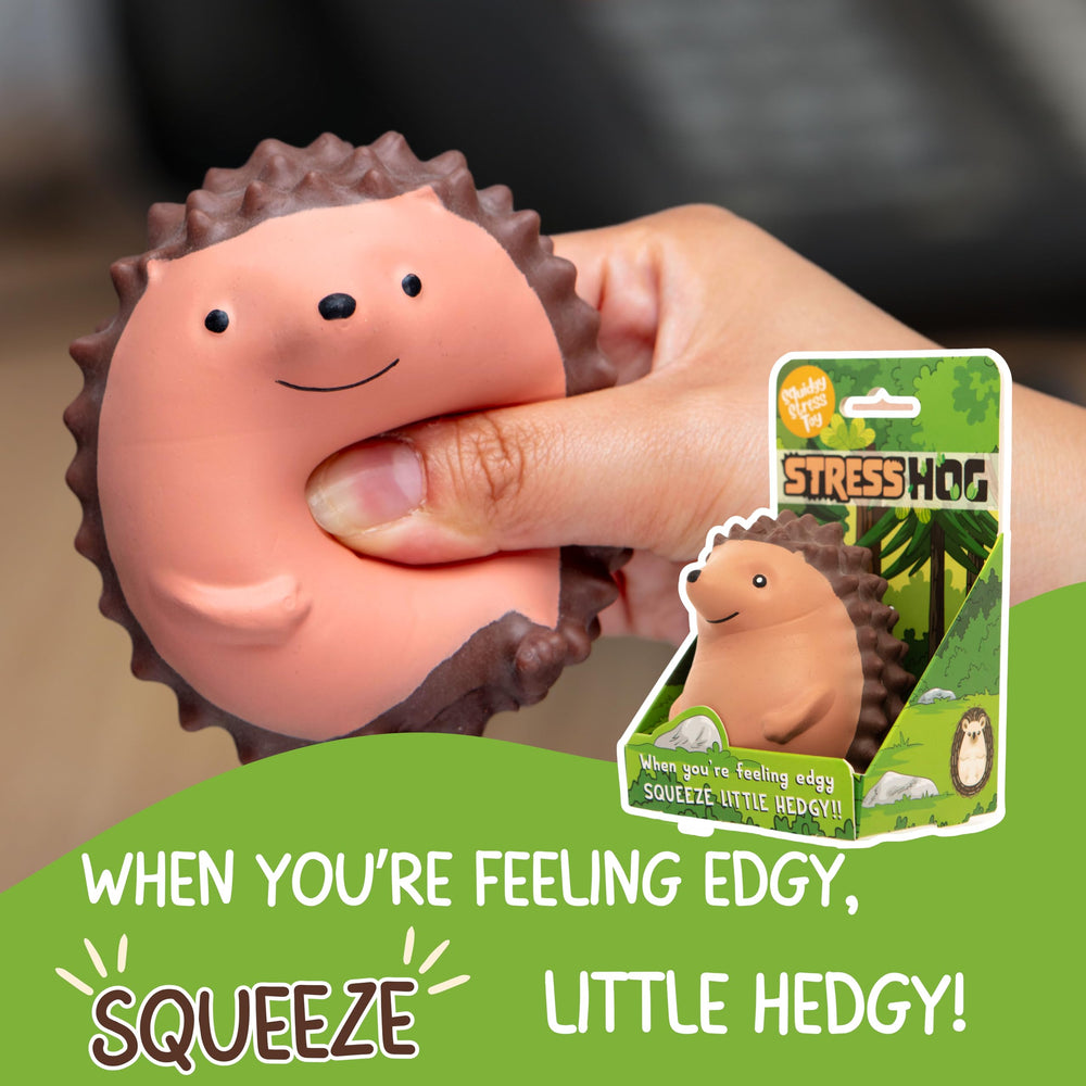 Boxer Gifts Stress Hog Toy on a desk demonstrates a compact hedgehog gadget