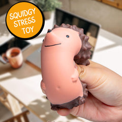 Boxer Gifts Stress Hog Toy in-hand use shows portable desk companion