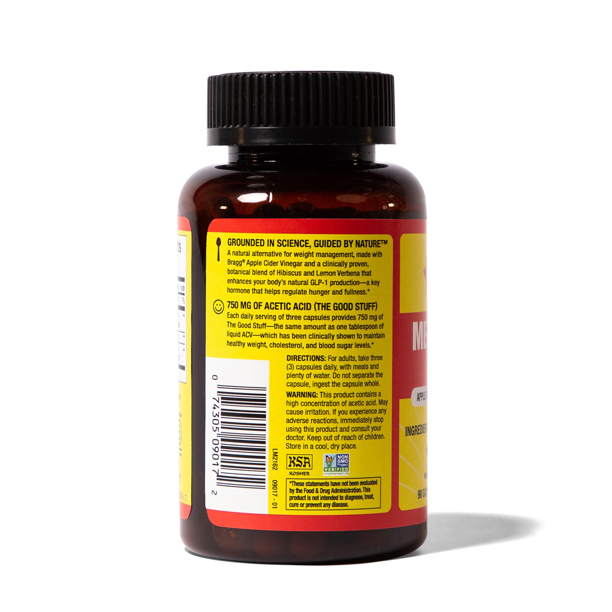 Bragg Metabolism Support capsules with glass of water for daily ritual.