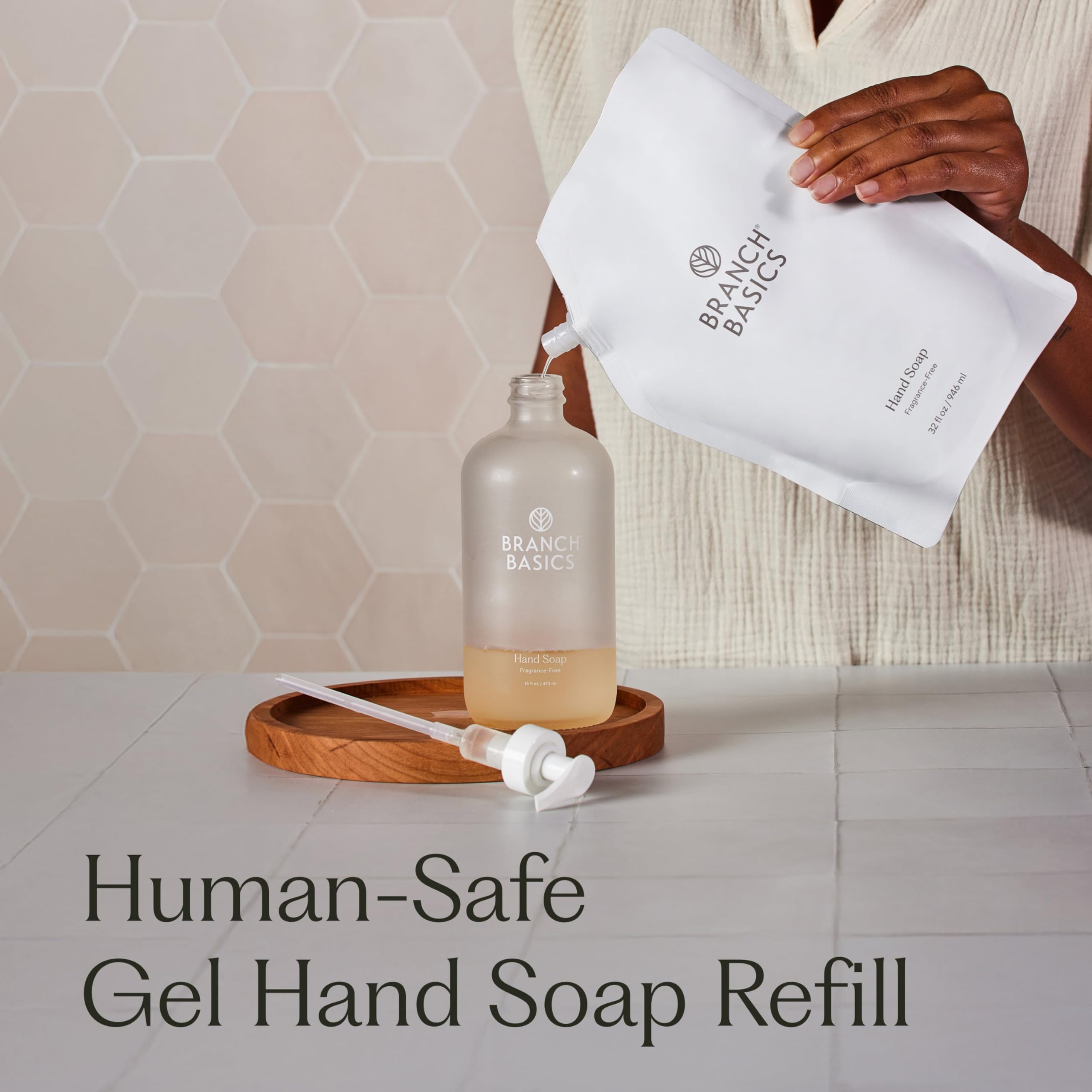 Branch Basics refill pour into bottle demonstrating easy refilling