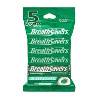 Breath Savers Wintergreen Mints on desk illustrate quick breath-freshening for meetings.
