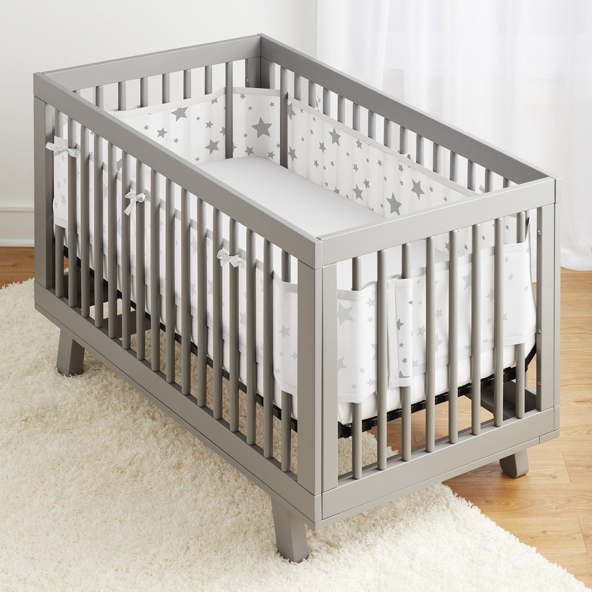 BreathableBaby Starlight liner on three sides for quick setup and adjustable coverage.