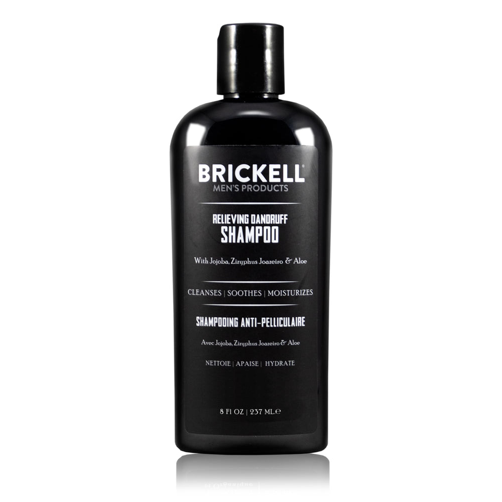 Brickell Men's Relieving Dandruff Shampoo bottle, may reduce flakes on the scalp.