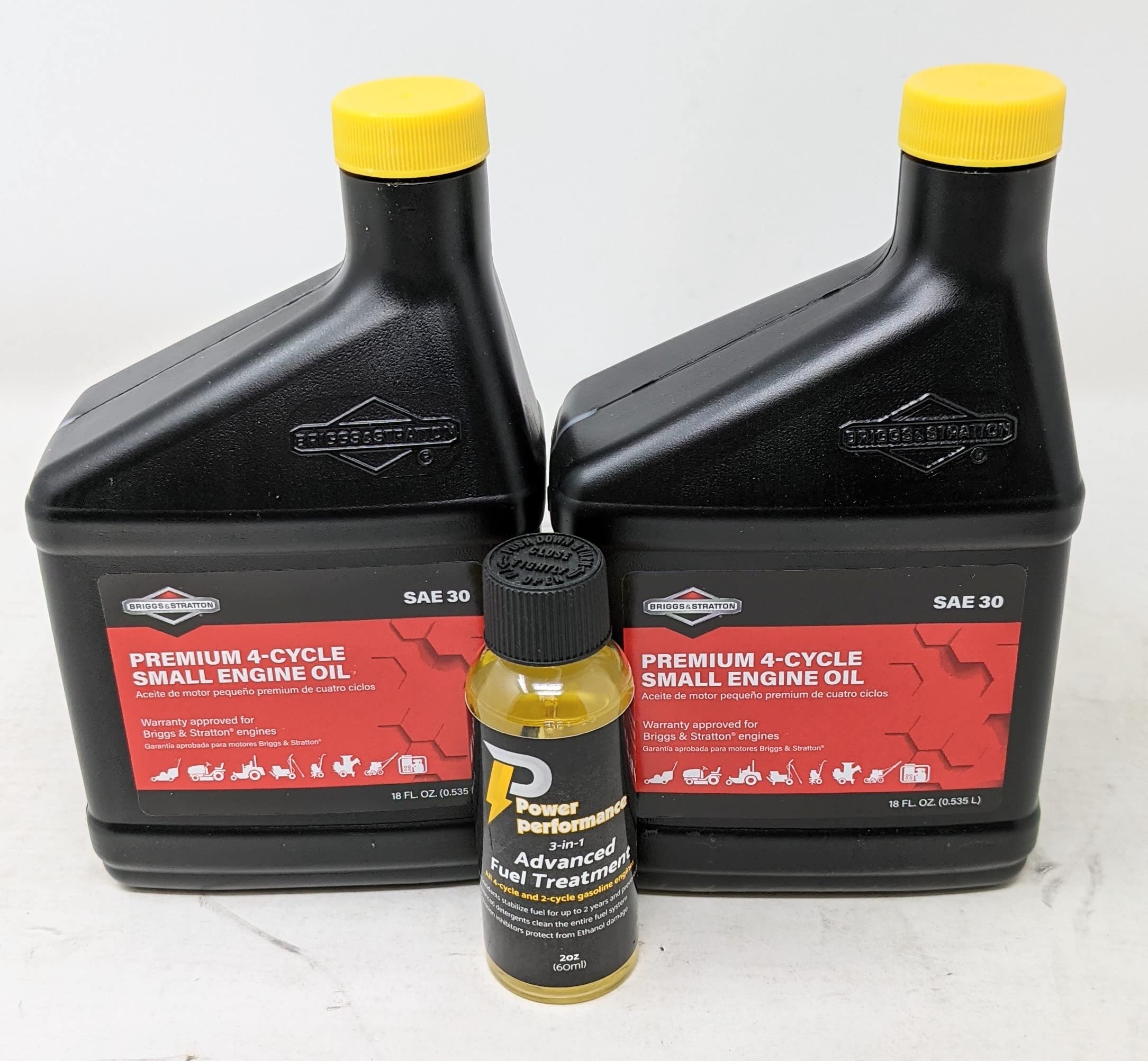 Briggs & Stratton 100005 oil bottle pouring, showing smooth lubrication for engines.
