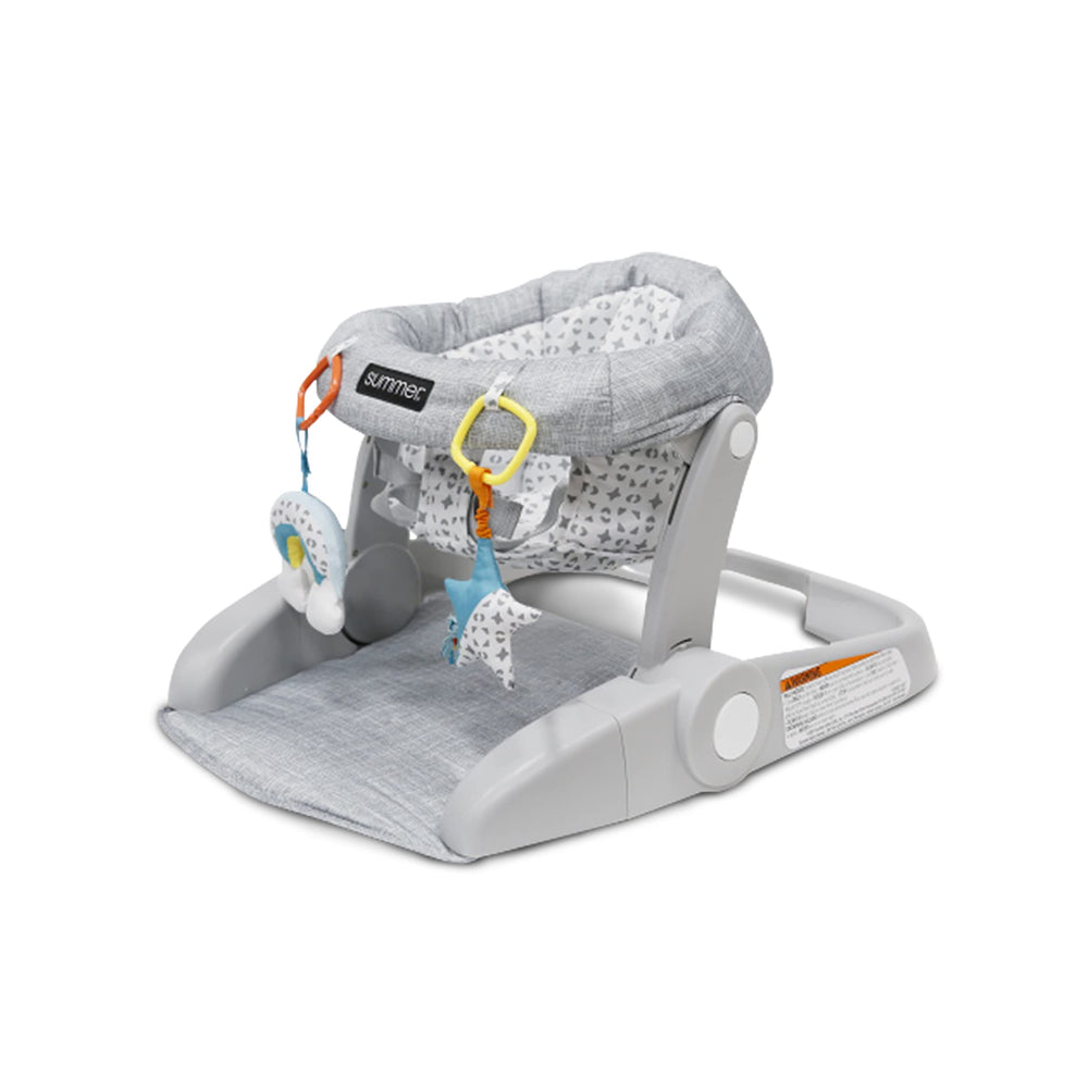 Bright Starts Learn-to-Sit seat front view shows cozy support for early sitting.
