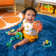 Bright Starts Little Shakers Grab & Spin Rattle with teether, soothing on the go.