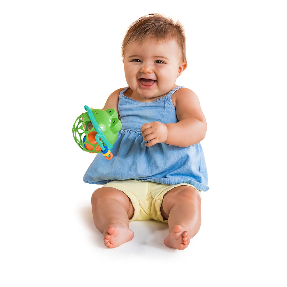 Bright Starts Little Shakers Flexible Oball material with finger holes eases grasp.