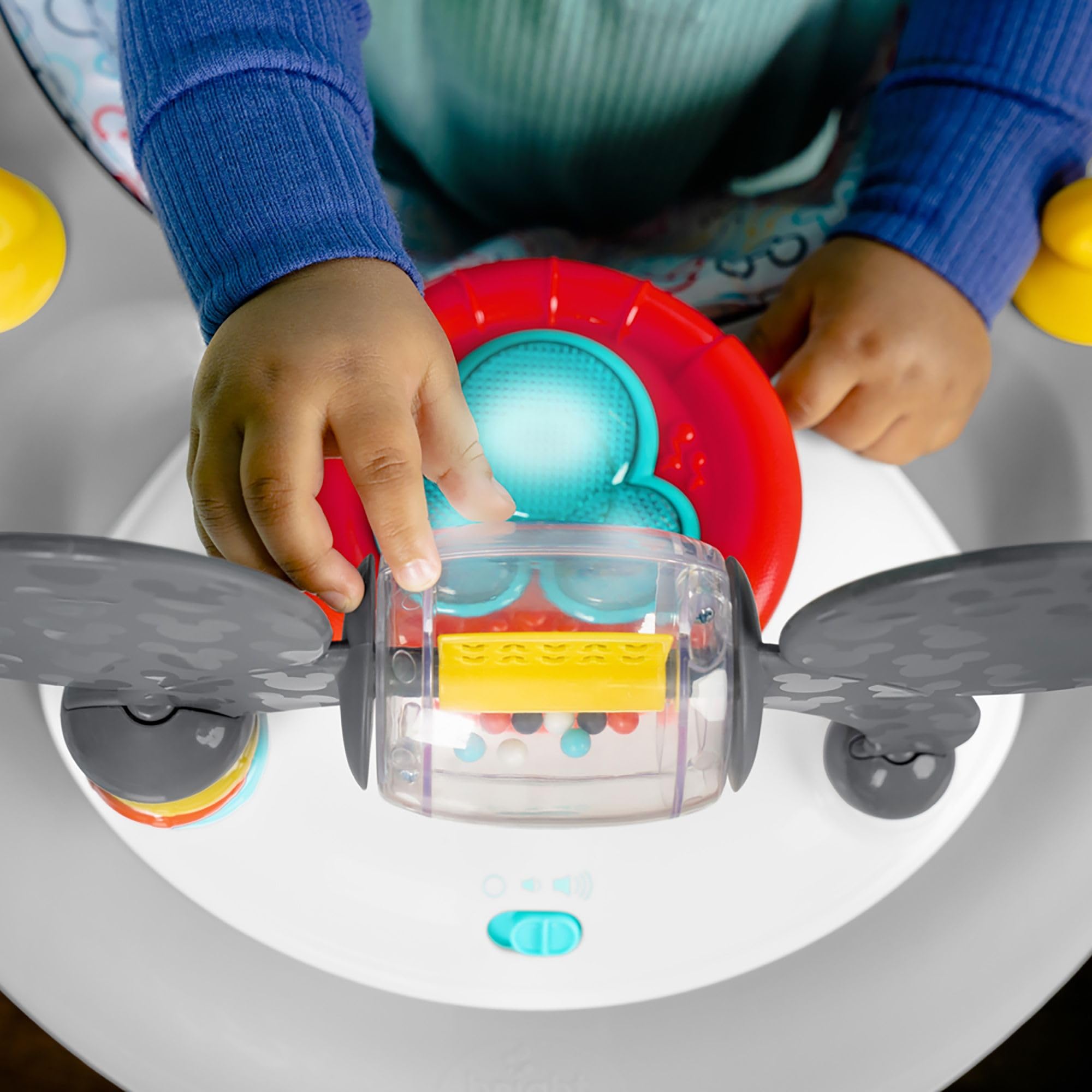 Bright Starts Mickey Mouse walker toy station removable for seated play on the go.