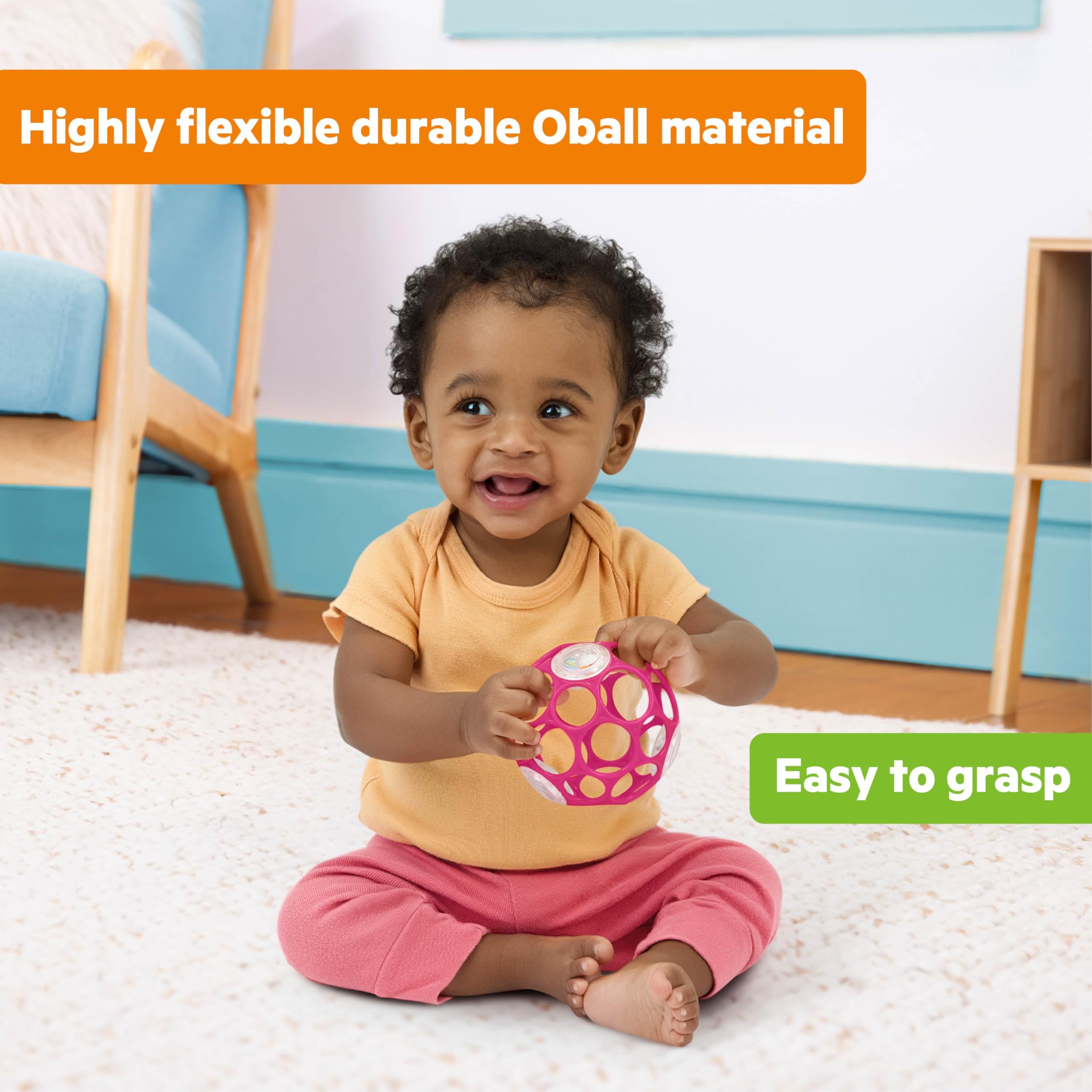 Bright Starts Oball pink rattle encourages baby to chase and crawl during play.