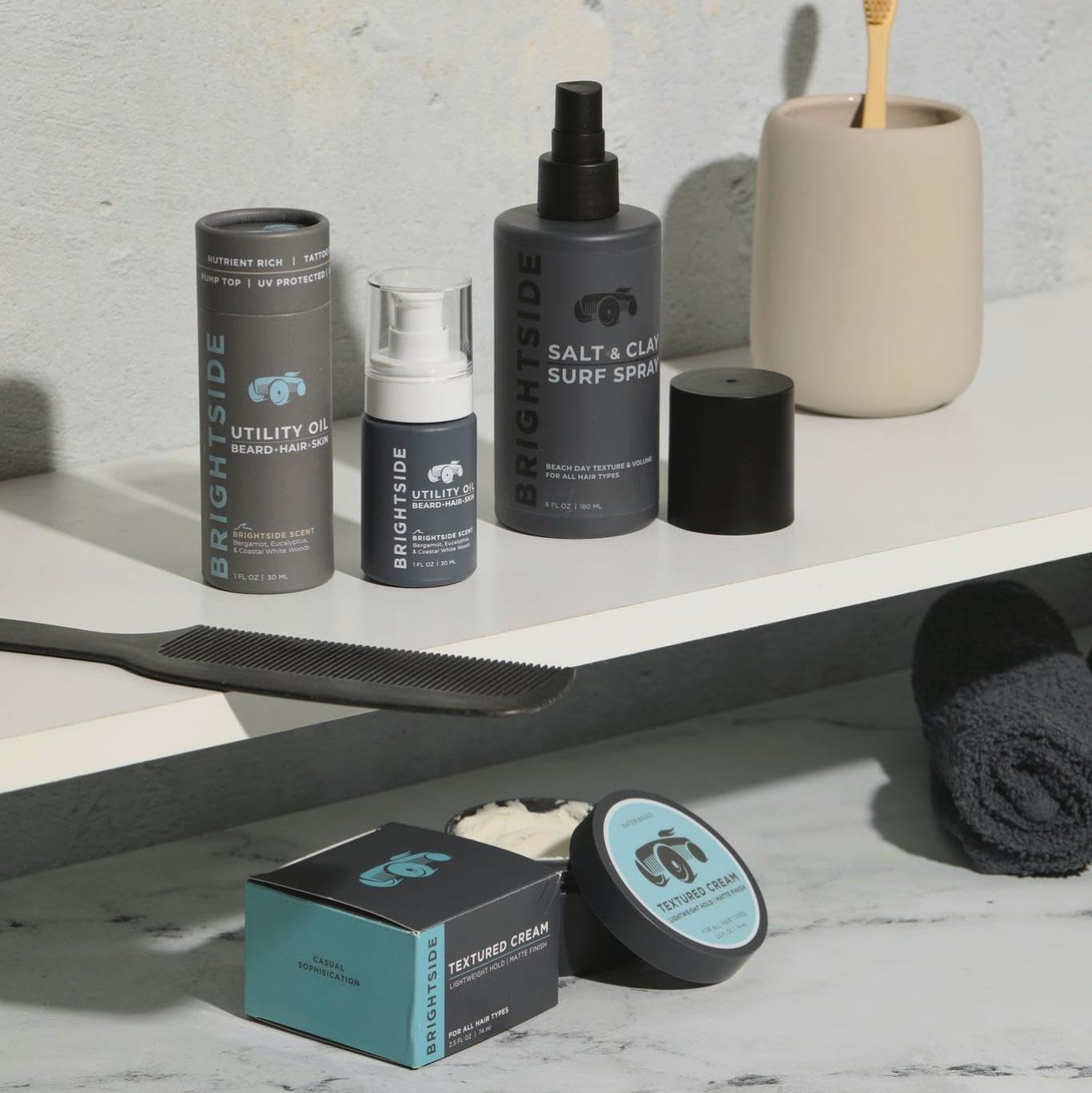 BRIGHTSIDE Salt and Clay Surf Spray 6oz packaging on shelf for travel-friendly use