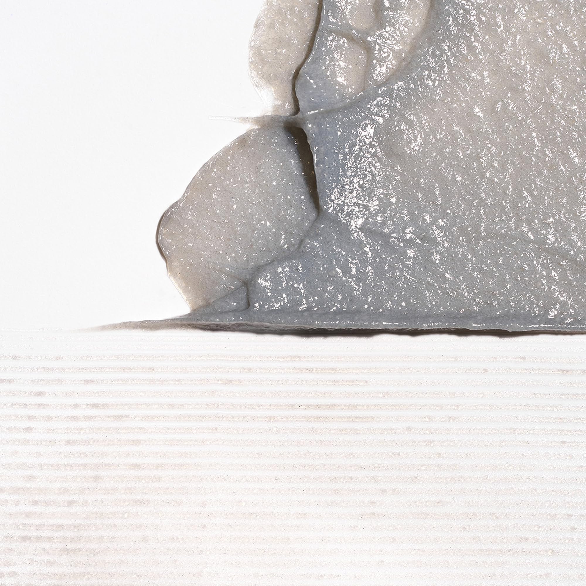 Briogeo Scalp Revival close-up of charcoal particles for gentle exfoliation