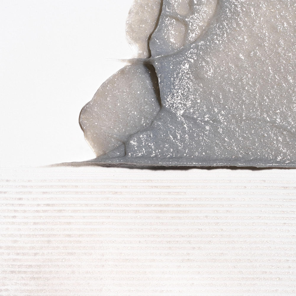 Briogeo Scalp Revival close-up of charcoal particles for gentle exfoliation