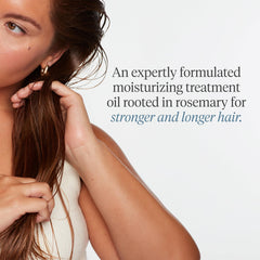 Dropper on Briogeo Scalp Revival oil ready for targeted scalp application.