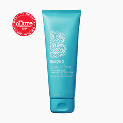 Briogeo Style Treat Yuzu and Plum Oil Air Dry Cream hands applying for smooth waves